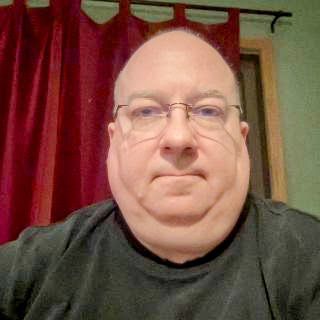 Bruce Timberlake posing for a profile picture.